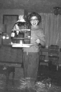 Leslie with her parakeet